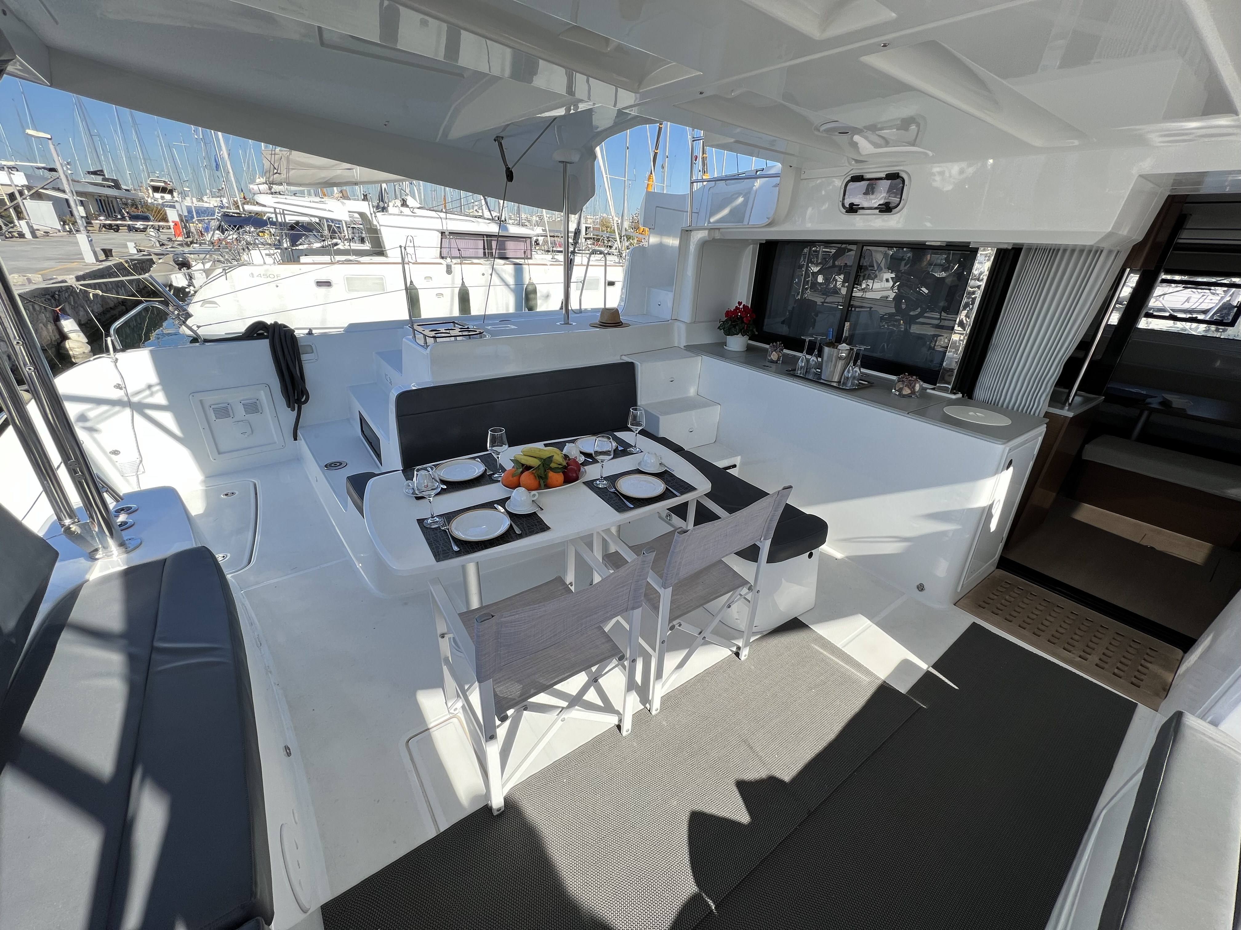 Cockpit dining setup aboard Kalisi Mou